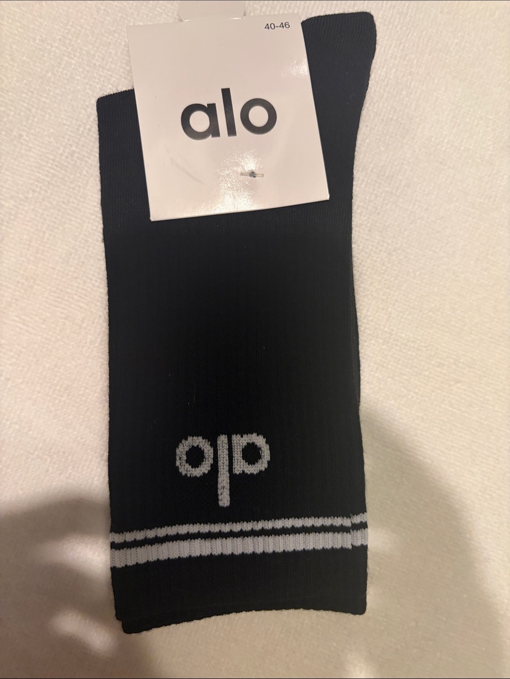 ALO Yoga Black Crew Socks with White Logo and Double Stripes